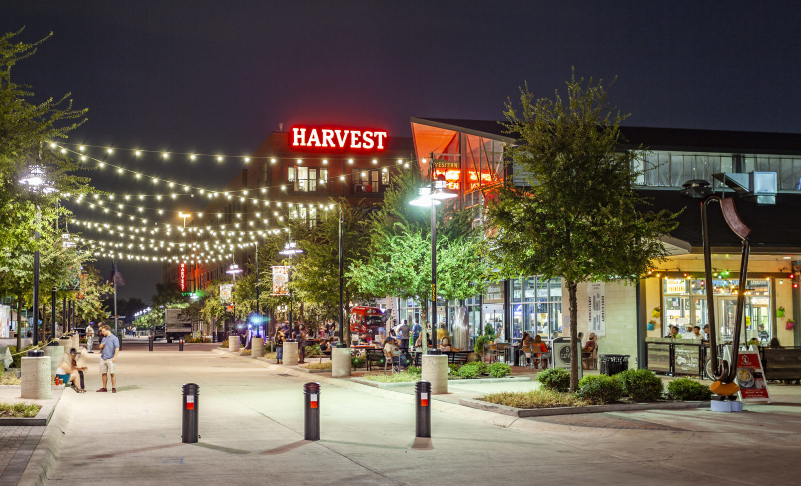 RLG Dallas Farmers Market - Harvest Lofts at Night with string lights